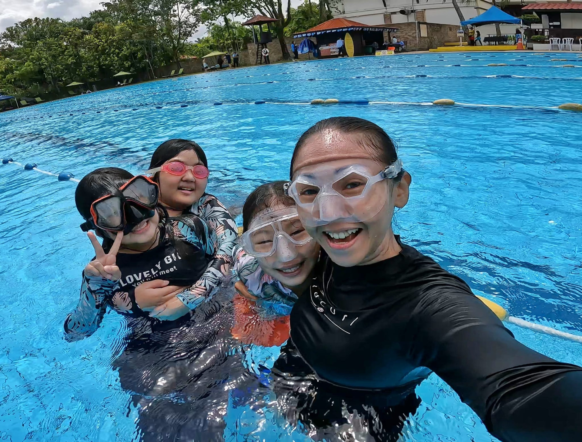 Kids taking a selfie with their instructor